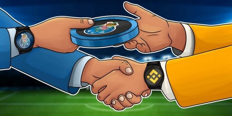 Immagine cartoon di due persone che si stringono la mano, ciascuna con orologi da polso con loghi (FC Porto e Binance). Una persona porge all'altra una moneta marchiata. La scena è ambientata sullo sfondo di uno stadio sportivo illuminato.