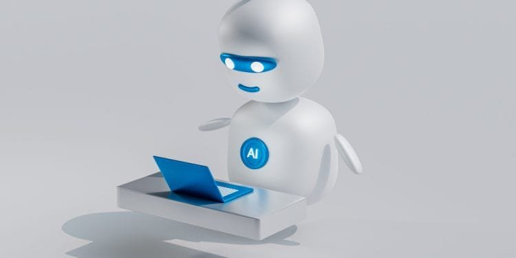Un robot con rendering 3D con corpo bianco, faccia blu e antenna utilizza un laptop blu su una superficie grigio chiaro. Indossando un distintivo con la scritta "Intelligenza Artificiale", appare focalizzato sullo schermo.