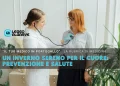 Un medico utilizza uno stetoscopio per esaminare una donna dai capelli rossi; l'immagine presenta un testo italiano sulla prevenzione del cuore in inverno e include un titolo di rubrica medica di Leggo Algarve.